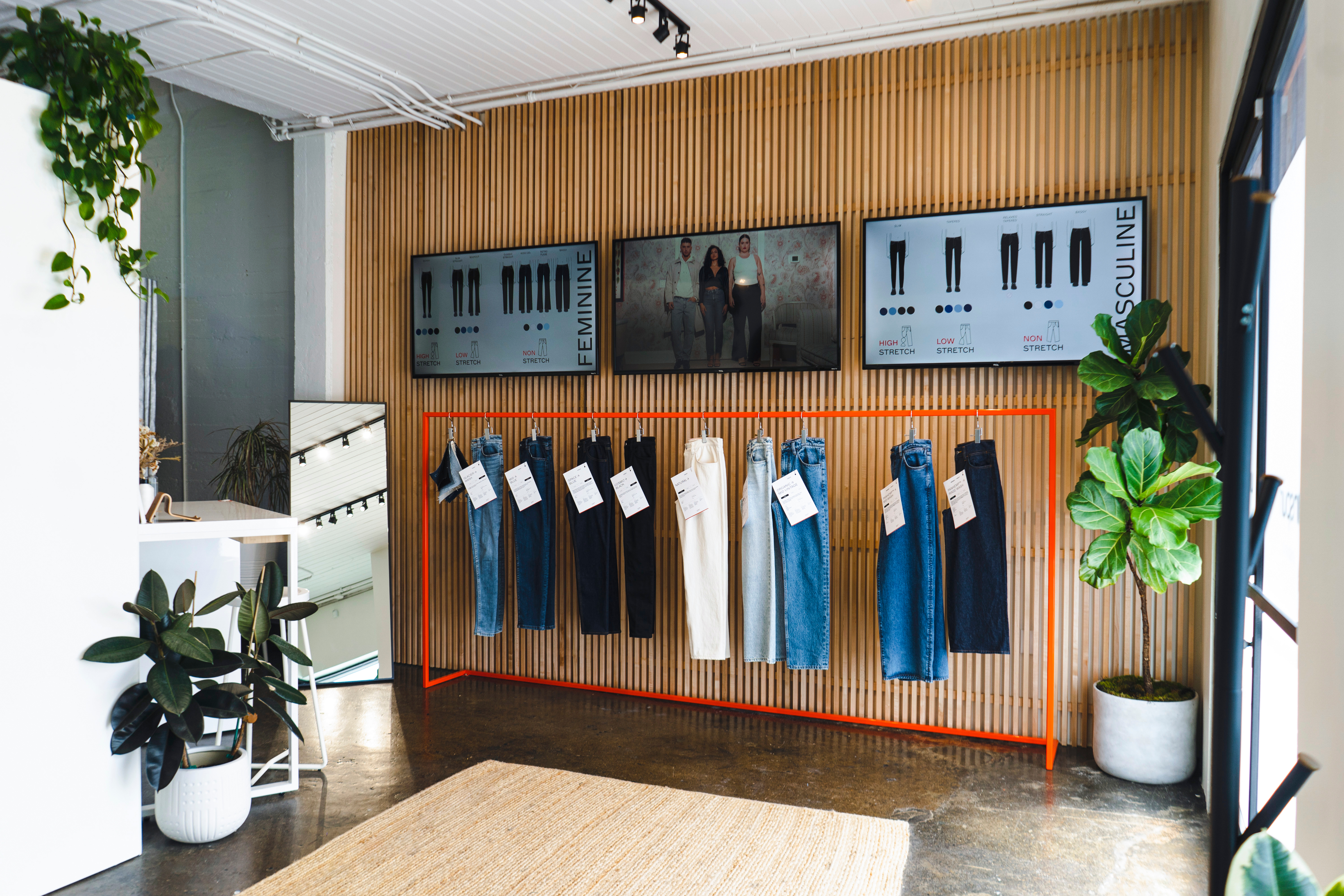 Woman with sunglasses walking down runway